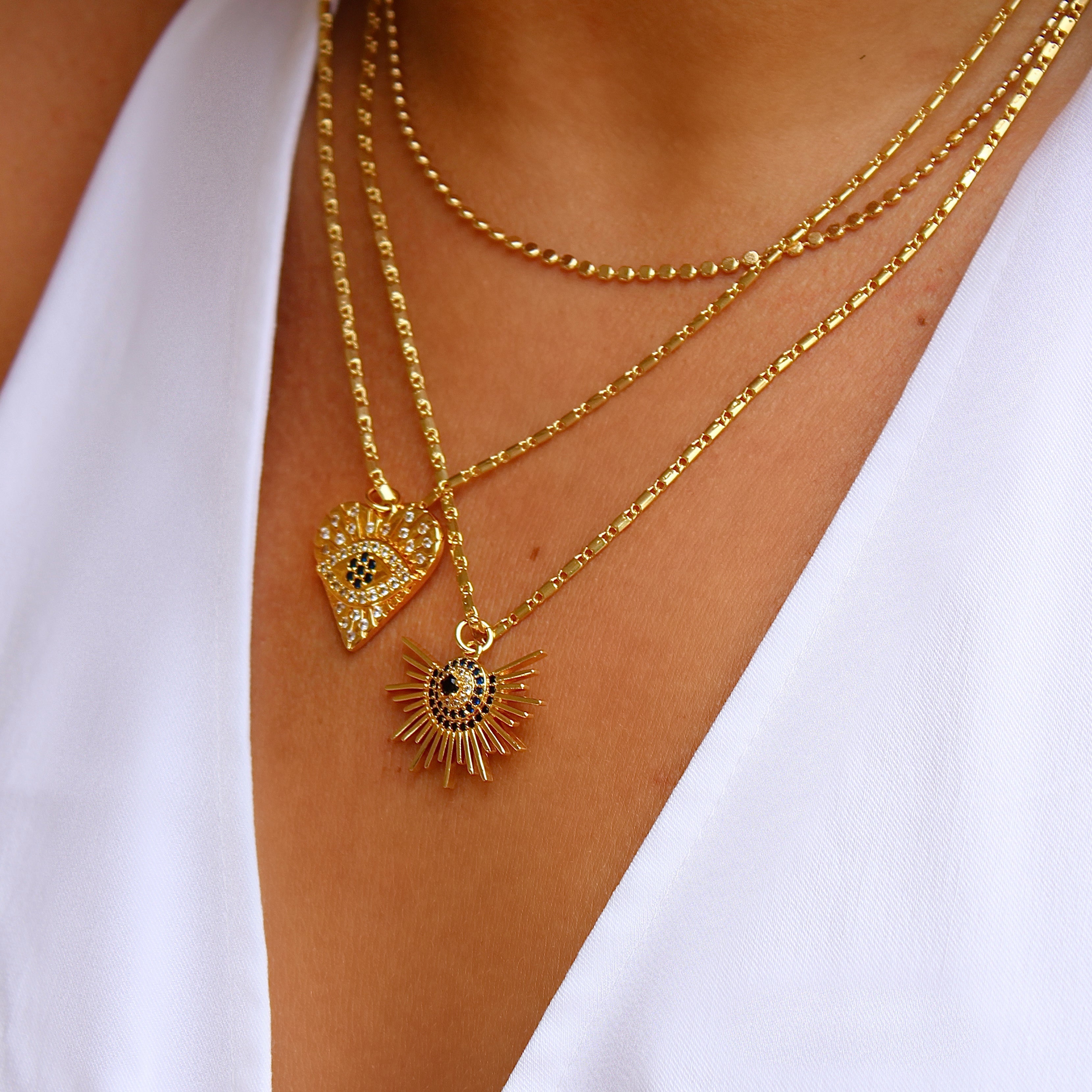 Evil Eye Sunburst Pendant – Vivian Grace